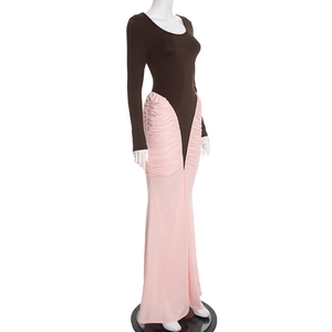 Detail view of contrast color pleated maxi dress with slim fit and shirred texture
