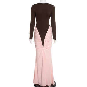 Detail of slim-fit maxi dress featuring V-shaped waist seam and pleated pink skirt