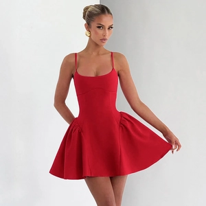 Detail of red sleeveless mini dress with ruffles and a flared A-line silhouette