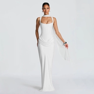 Detail of elegant white floor-length evening dress with draped waist and halter scarf neck