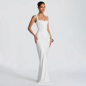 Detail of the elegant ruched waist and silky fabric on the white slim sleeveless dress