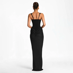 Detailed back view of a black slim-fit evening gown with thin straps and satin texture