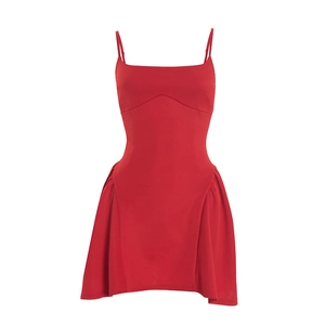 Detail view of the red sleeveless mini dress featuring side ruching and spaghetti straps