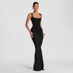 Detail of elegant black bodycon evening dress featuring a square neckline and ruching