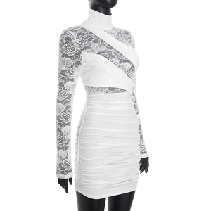 Detail of white lace stitching and ruched texture on this slim fit evening dress