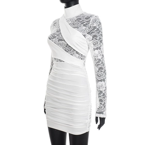 Detail of white mini dress featuring floral lace sleeves and ruched body on mannequin