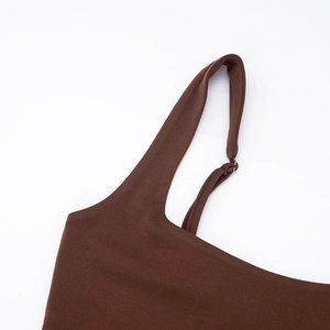 Detail of the high-quality dark brown matte fabric and durable wide shoulder strap stitching