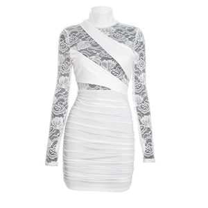 Close-up of white lace patchwork dress with high neck and elegant ruched details