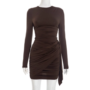 Detail view of the elegant ruched texture and slim fit design on this brown long sleeve dress