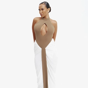 Elegant halter neck dress with teardrop cutout and white pleated maxi skirt