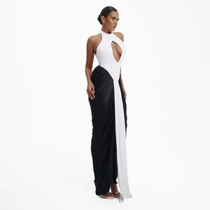 Detailed view of the halter neck design with a teardrop cutout on a contrast dress