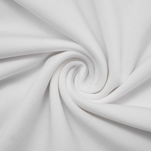 Macro shot of white ribbed knit fabric texture showing fine vertical stripe patterns
