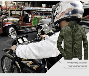 Detailed view of olive green motor biker jacket with stand collar and zipper pockets