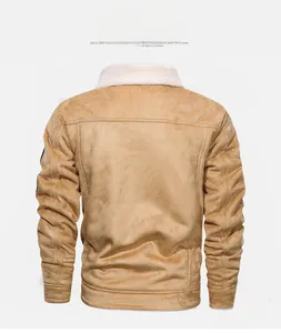 Detail of suede jacket back with shearling collar and clean stitching in camel color