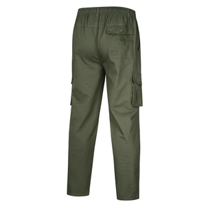 Deep green cotton cargo pants for men featuring multiple pockets and elastic waist design