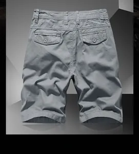 Rear view of dark grey cargo shorts featuring durable cotton twill and buttoned flap pockets
