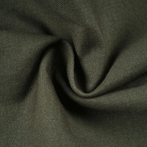 Detailed macro shot showing olive green cotton twill fabric texture and weave of these cargo pants