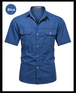 Close-up of royal blue short sleeve outdoor shirt with flap pockets and wood buttons