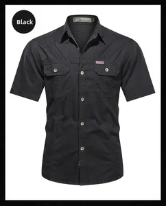 Detailed macro shot of a black outdoor cargo shirt with buttoned pockets and collars