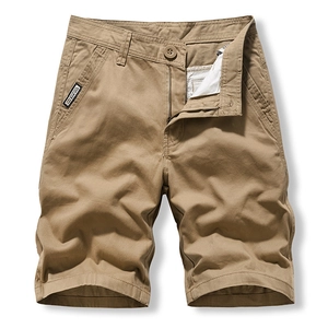 Casual men's khaki cotton cargo shorts with side pockets and a zip fly closure