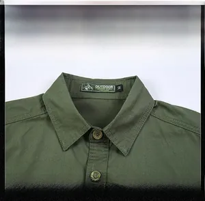 Detailed view of military green collar with woven outdoor label and city engraved button