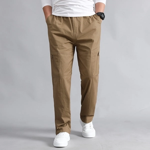 Men's khaki cargo pants with multiple pockets and elastic waist in a relaxed fit