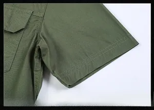 Detail of army green short sleeve shirt showing durable stitching and workwear pocket