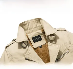 Detail of khaki jacket collar with faux shearling lining and buckle strap feature