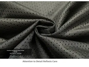 Detail of breathable black mesh lining and secure inner pocket for outdoor jackets