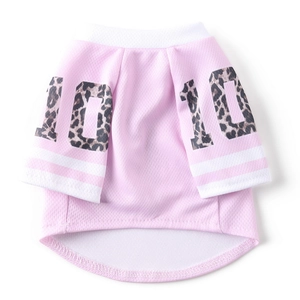 Detail of pink mesh pet soccer jersey with leopard print number 10 and breathable fabric