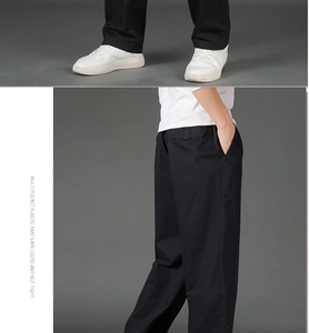 Detail view of black cargo pants featuring elastic waist and side pockets for men