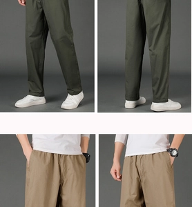 Detail view of khaki and army green straight-leg cotton utility trousers with elastic waist