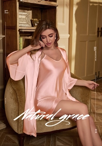 Detail of light pink silk satin pajama set with V-neck camisole and matching robe
