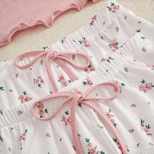 Three-piece floral pajama set with lace camisole, shorts, and soft ribbed fabric