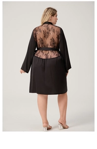 Detail view of black plus size satin robe featuring intricate floral lace back paneling