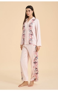 Elegant pink satin pajama set with floral patterns on sleeves and long pants
