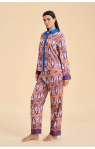 Ethnic ikat pattern satin pajamas set featuring long sleeves and contrast blue collar