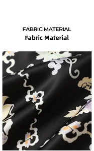 Detail of elegant black floral satin pajamas fabric with traditional Chinese cloud patterns