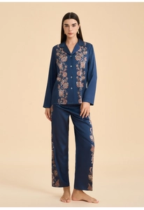 Navy blue satin pajama set featuring ethnic floral prints on cuffs and trouser legs