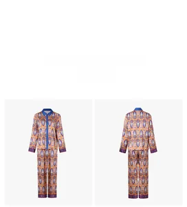Detail view of orange ethnic print pajama set with long sleeves and blue trim accents