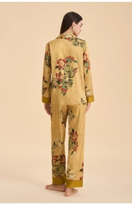 Elegant gold floral pajamas for women featuring a detailed red flower and bird silk print