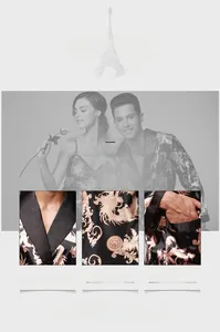 Detail view of V-neck lapel and golden dragon print on luxury black silk bathrobe