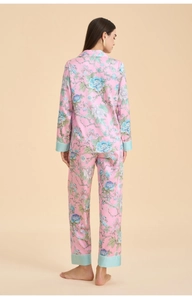 Back view of pink floral pajama set with satin finish and elegant green sleeve piping
