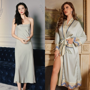 Detailed view of sage green satin robe set with ornate bohemian prints and silk texture