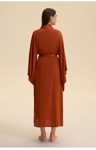 Back view of long satin burnt orange robe with long sleeves and matching waist belt