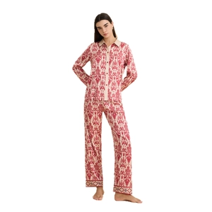 Ethnic Ikat print satin pajama set with long sleeve button-up top and trousers
