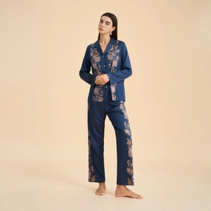 Women's dark blue satin pajama set with floral print trim and V-neck button-up top