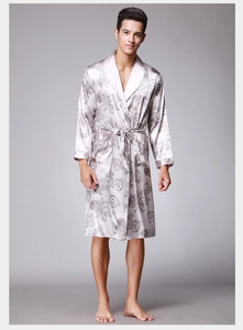 Detailed view of men's silk-like grey robe with scroll pattern and tie waist