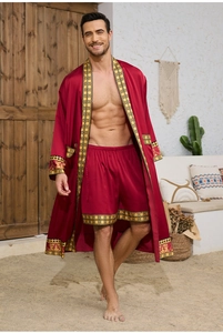 Detail of red satin robe set with golden baroque patterns and greek key trims