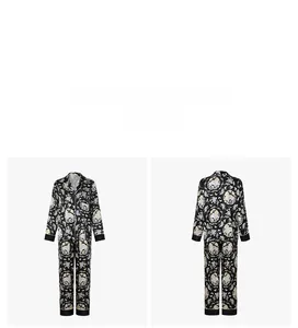 Detail of floral long-sleeve pajama set with contrast piping and notch collar detail